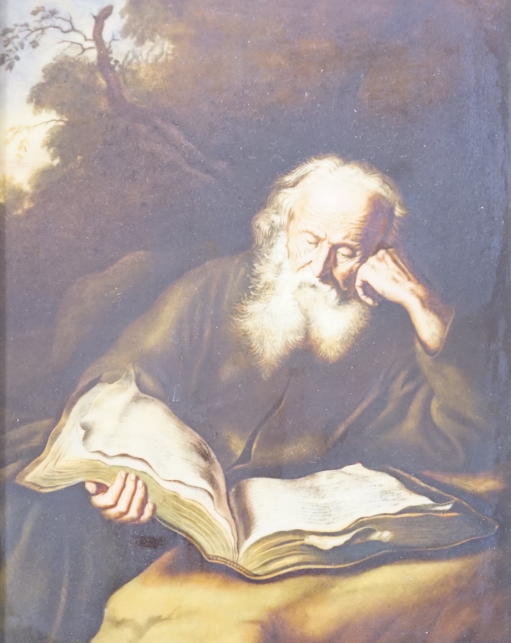 A Rosenthal porcelain plaque printed with Einsiedler Von Koninck, study of a saint reading a bible, 24 x 18cm